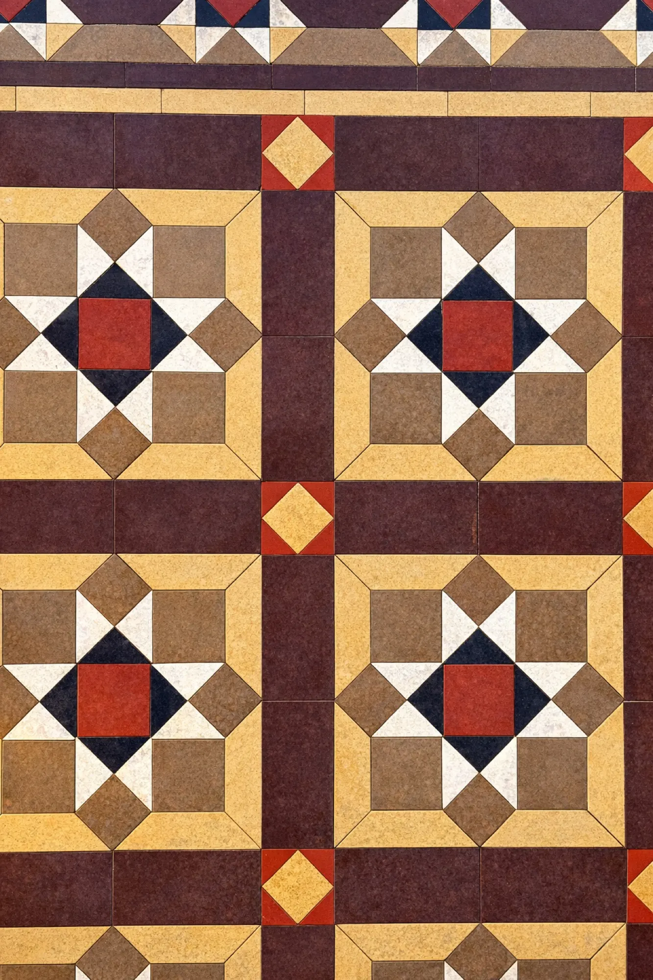 A tessellated tile floor in a geometric Victorian pattern